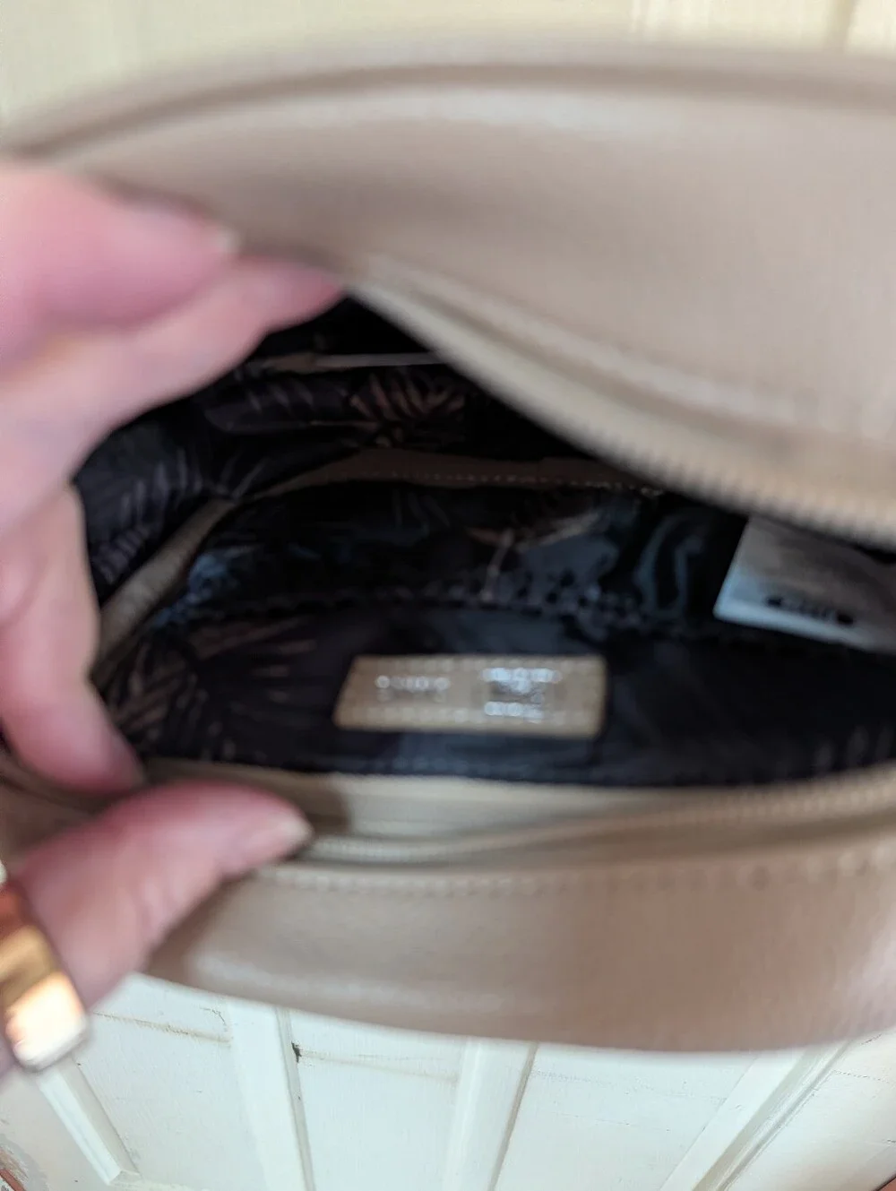 lug Pebbled Quilted Crossbody Bag in Taupe